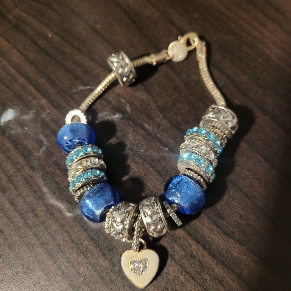 Blue, white, and silver pandora like bracelet for medium/large wrists
